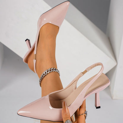 Escarpins pointus de style slingback en cuir rose pastel Nolisse avec petit talon aiguille fin pour femme.