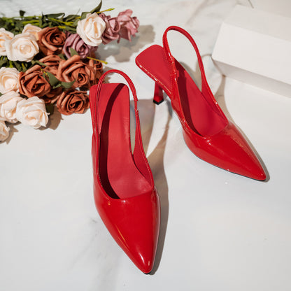 Escarpins pointus de style slingback en cuir rouge Nolisse avec petit talon aiguille fin pour femme.